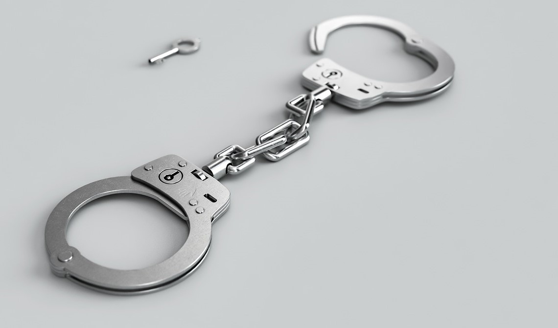 Parole Definition in Law 1 handcuffs 3655288 1280